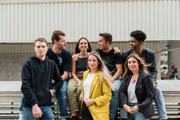 Content multiracial people chilling on street