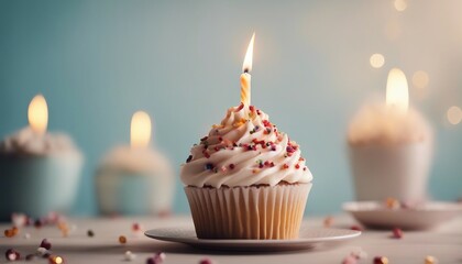 Delicious birthday cupcake on table on light background


