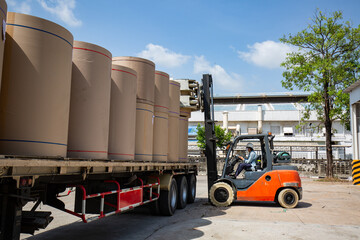 Vertical paper move for axis forklift truck waiting to be used  recycle on the truck © chitsanupong
