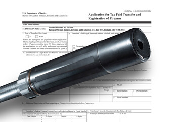 Silencer casting a shadow on public domain ownership form ATF requires a person to fill out and pass before taking ownership to shoot - obrazy, fototapety, plakaty