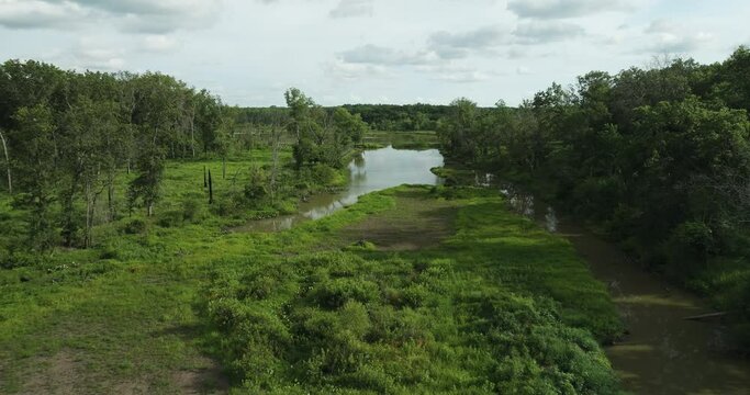 Fly Over Vegetated Swamps In Spile Lake, Vernon County, Missouri, United States. Aerial Wide Shot