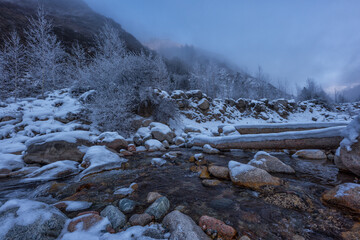 Mountain river on a foggy winter day in the vicinity of the Kazakh city of Almaty