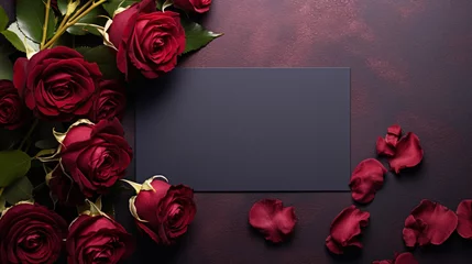 Tuinposter Beautiful red rose flower bouquet and blank note paper on dark background, congratulations and anniversary concept, Valentine s day background. © Sunday Cat Studio