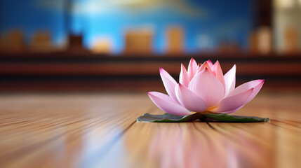 Kwiat lotosu na drewnianej podłodze w salce do jogi, relaksu i treningu - obrazy, fototapety, plakaty