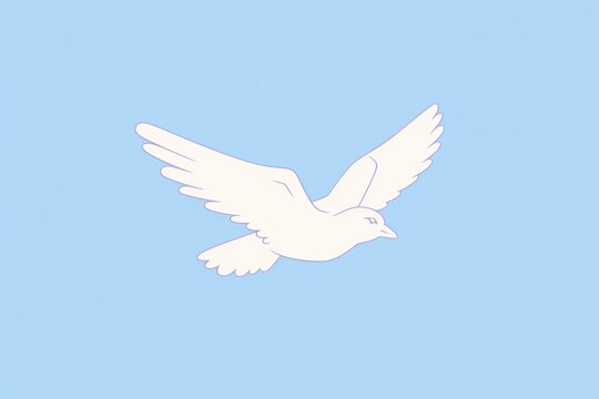 White dove flying on a blue sky with wings spread as a symbol of peace