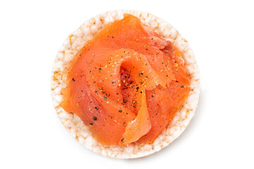 Tasty Rice Cake Sandwich with Fresh Salmon Slices Isolated on White - Top View. Easy Breakfast and Diet Food. Crispbread with Red Fish. Healthy Dietary Snack - Isolation
