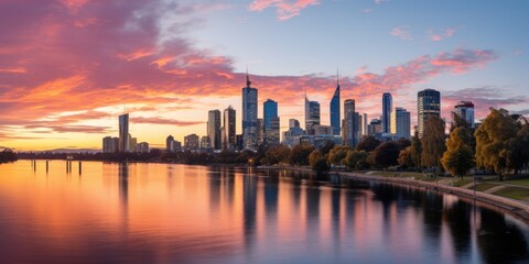 Fototapeta premium Beautiful sunset evening afternoon panorama overlooking South Bank Parklands, The Brisbane River, and Brisbane's City Skyline during winter