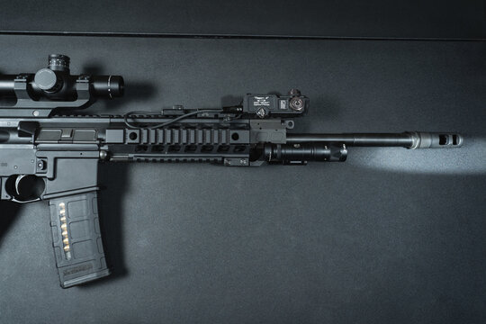 Baltic States, November 23, 2023.  Tactical rifle sig sauer 516 patrol with optical sight, zenitco laser sight and surefire m340v flashlight.