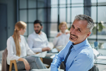 Fototapeta premium Diverse business people partners group negotiating at boardroom meeting
