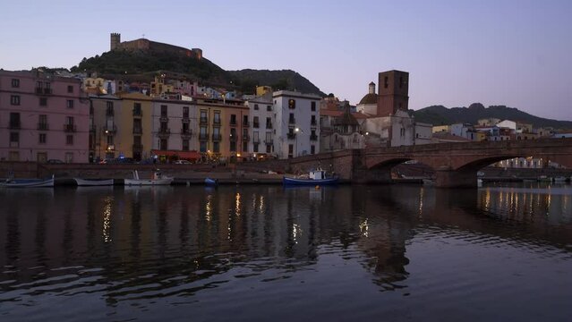 View of Bosa historic colorful city with Temo river at sunset in Sardinia, Italy