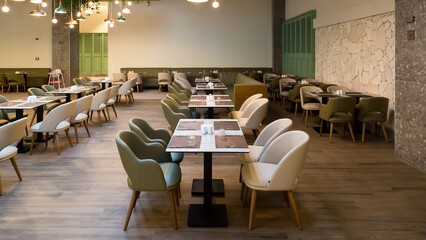 Large hall in a restaurant with furniture, without people.