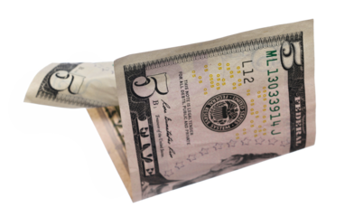 Flying five dollar bill isolated on white, clipping path