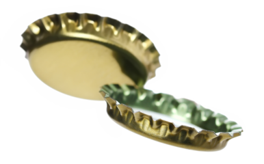 New golden bottle cap for beer in flying, isolated on white, clipping path, macro