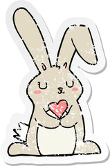 distressed sticker of a cartoon rabbit in love