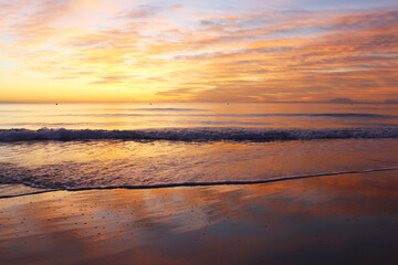 Fototapeta na wymiar natural background of a beautiful sunset on the beach