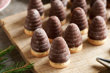 Preparation of Christmas cookies called beehives or wasp nests