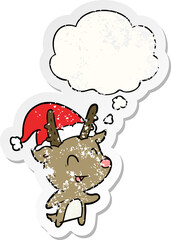 cartoon christmas reindeer with thought bubble as a distressed worn sticker