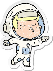 distressed sticker of a cartoon confident astronaut