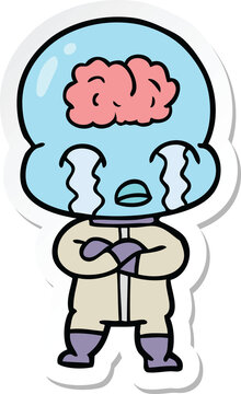sticker of a cartoon big brain alien crying