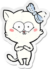 Obraz na płótnie Canvas distressed sticker of a cartoon cat