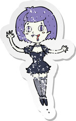 retro distressed sticker of a cartoon happy vampire girl
