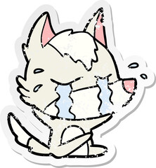 distressed sticker of a cartoon crying wolf
