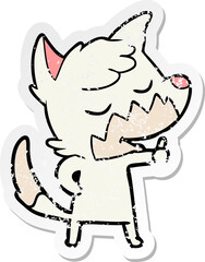 distressed sticker of a friendly cartoon fox giving thumbs up sign