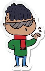 sticker of a cartoon boy wearing sunglasses