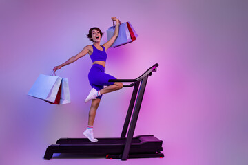 Photo of excited sporty shopaholic girl feel determination motivation in shopping sport store for...