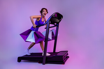 Photo of crazy amazed joyful sporty lady run machine fast want hurry for black friday sales...