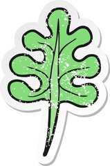 retro distressed sticker of a cartoon leaf