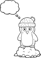 freehand drawn thought bubble cartoon penguin wearing hat