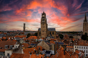 Obraz premium Medieval Town Bruges old city in Flanders in Belgium Europe. Art and culture. Tourists from the world. Ancient medieval architecture gothic with towers buildings, canals, cobbled alleyways horses