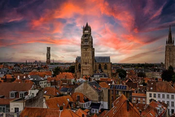 Poster Medieval Town Bruges old city in Flanders in Belgium Europe. Art and culture. Tourists from the world. Ancient medieval architecture gothic with towers buildings, canals, cobbled alleyways horses © fabrizio