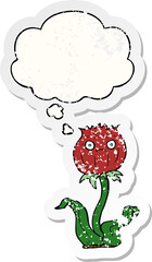 cartoon thistle with thought bubble as a distressed worn sticker