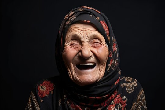 Happy Old Turkish Woman On Black Background