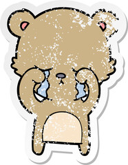distressed sticker of a crying cartoon bear