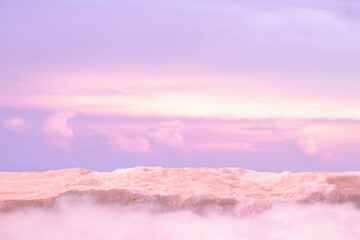 Obraz premium Stone podium tabletop floor in outdoor on sky pink gold pastel soft cloud blurred background.Beauty cosmetic product placement pedestal present promotion stand display,summer paradise dreamy concept.