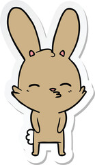 sticker of a curious bunny cartoon