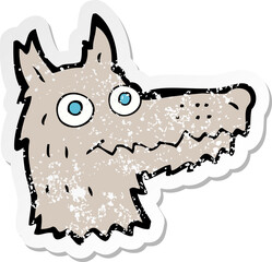 retro distressed sticker of a cartoon wolf head