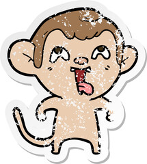 distressed sticker of a crazy cartoon monkey