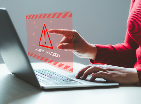 System hacked warning alert on notebook. Cyber attack on computer network, Virus, Spyware, Malware or Malicious software. Cyber security and cybercrime. Compromised information internet.