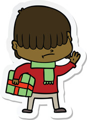 sticker of a cartoon boy with untidy hair