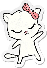 distressed sticker of a cute cartoon cat with bow