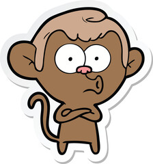 sticker of a cartoon hooting monkey