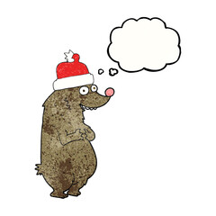 freehand drawn thought bubble textured cartoon bear wearing christmas hat