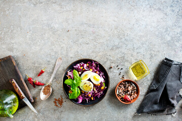 Cabbage salad with corn and boiled egg.