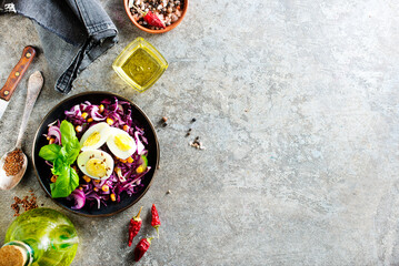 Cabbage salad with corn and boiled egg.