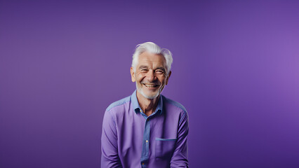 Fototapeta premium Old man smiling isolated on studio background. Copyspace area