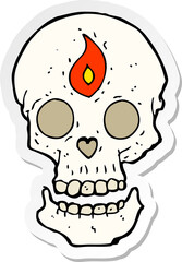 sticker of a cartoon mystic skull